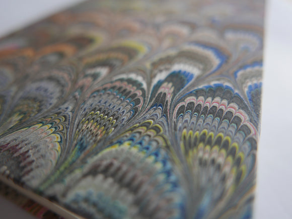 A classically-styled journal with a cover of Italian marbled paper.