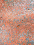 Hand marbled sheet of paper - orange peacock pattern