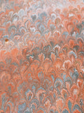 Hand marbled sheet of paper - orange peacock pattern