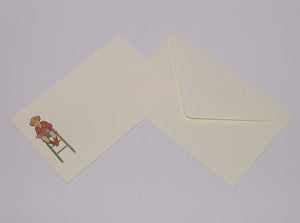 Single card boy on stool, card and envelope