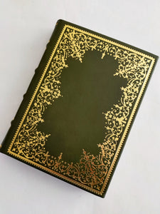 Italian leather journal with hand tooled gold leaf cover and spine, marbled end paper. assorted colours