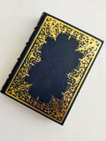 Blue Italian leather journal with hand tooled gold leaf cover and spine, marbled end paper