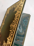 Green Italian leather journal with hand tooled gold leaf cover and spine, marbled end paper