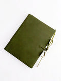 Green soft leather journal with ties, blank pages