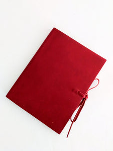 Burgundy soft leather journal with ties, blank pages