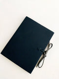 Blue soft leather journal with ties, blank pages