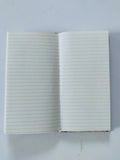 Lined inside of small marbled notebook