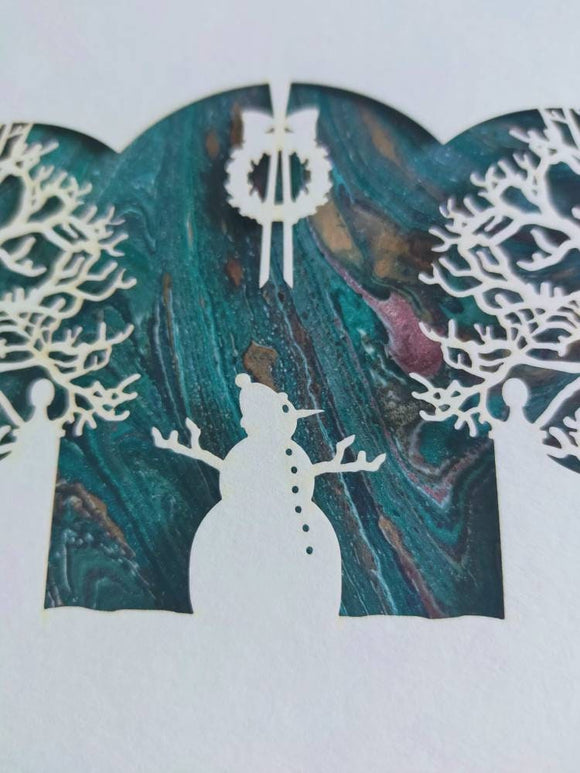 Laser cut snowman Christmas card - hand marbled