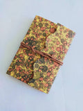 Small lined Notebook, soft cover with tie. Hand marbled