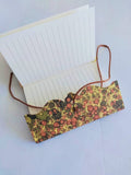 Small lined Notebook, soft cover with tie. Hand marbled