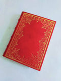 Red Italian leather journal with hand tooled gold leaf cover and spine, marbled end paper