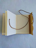 Small lined Notebook, soft cover with tie. Hand marbled