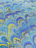 Hand marbled sheet of paper - blue, green, gold, yellow peacock