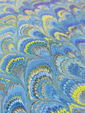 Hand marbled sheet of paper - blue, green, gold, yellow peacock