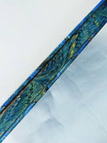 Decorated edge of the marbled A4 guest book, green and blue