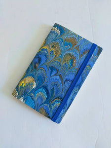 100% recycled soft cover journal, hand marbled withbookmark and elastic band