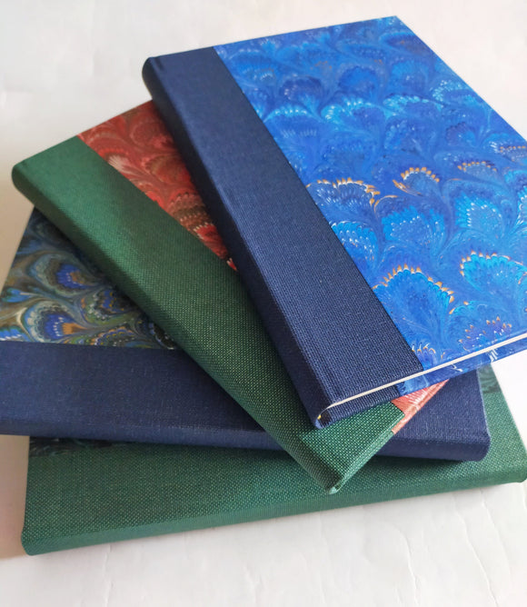 Large marbled address book with canvas on the spine, multiple colours