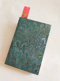 hand marbled bookmark insidea book