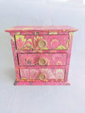 Pink marbled desktop organizer with three drawers